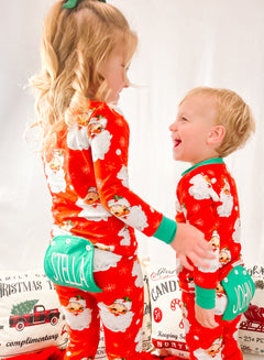 The Stella Lane Buttflap Pajamas in Vintage Santa